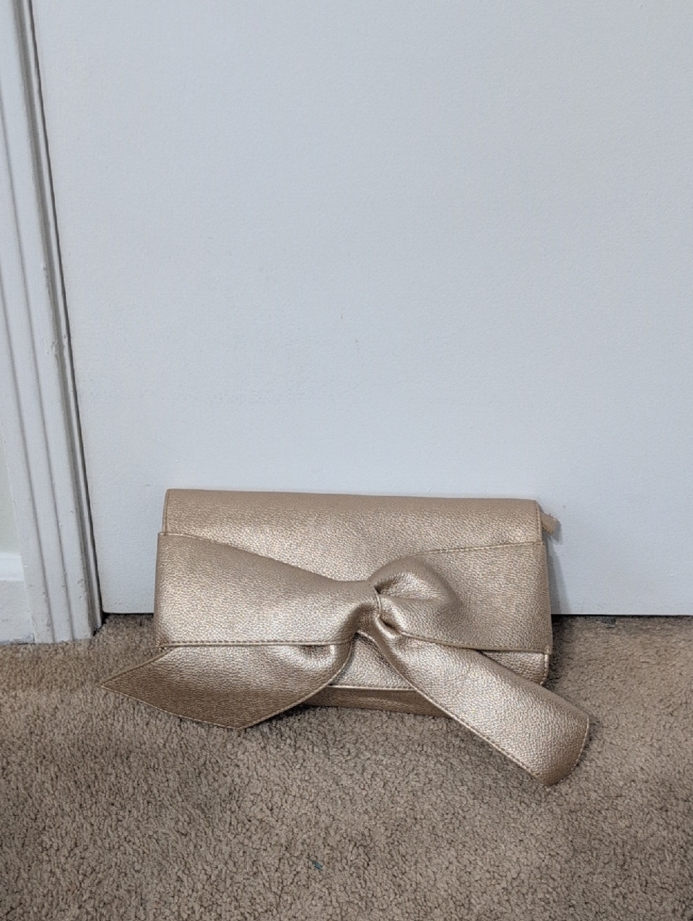 JustFab Metallic Gold Bow Clutch